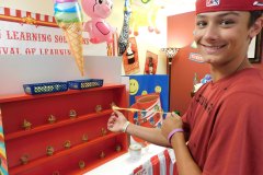 Happy child showing off eye-hand coordination.